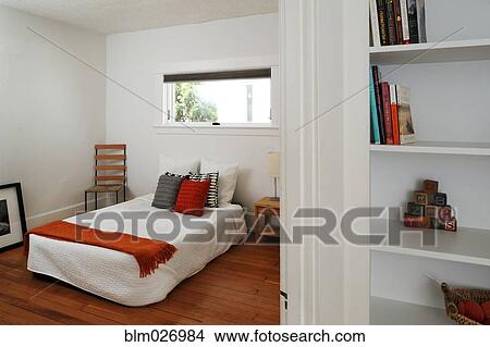 Chair and bed in bedroom View Large Photo Image Picture - Chair and bed in bedroom. Fotosearch