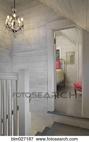 Chandelier over staircase in modern house View Large Photo Image Stock Photo - Chandelier over staircase in modern house. Fotosearch