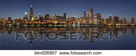 Stock Photo - Chicago skyline lit up at night, Chicago, Illinois, United States. Fotosearch