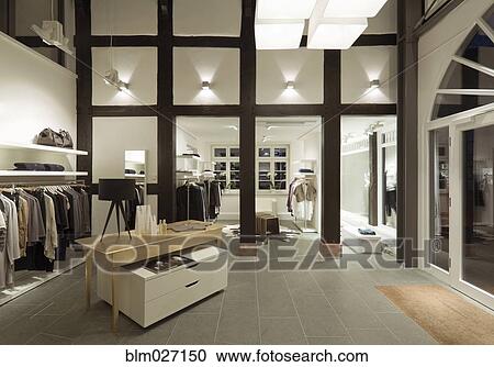 Clothes for sale in modern store View Large Photo Image Stock Image - Clothes for sale in modern store. Fotosearch