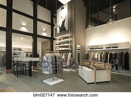 Clothes for sale in modern store View Large Photo Image Stock Photo - Clothes for sale in modern store. Fotosearch
