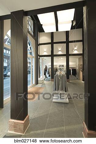 Clothes for sale in modern store View Large Photo Image Stock Photo - Clothes for sale in modern store. Fotosearch
