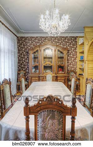 Dining table and hutch in dining room View Large Photo Image Stock Photo - Dining table and hutch in dining room. Fotosearch