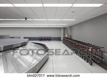 Empty baggage claim area in airport View Large Photo Image Stock Photo - Empty baggage claim area in airport. Fotosearch