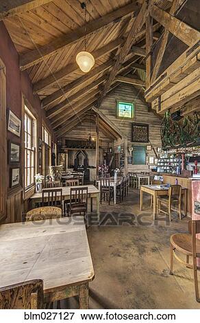 Empty chairs and tables in restaurant View Large Photo Image Stock Photo - Empty chairs and tables in restaurant. Fotosearch
