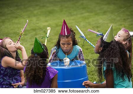 Girls celebrating birthday in backyard View Large Photo Image Stock Photography - Girls celebrating birthday in backyard. Fotosearch