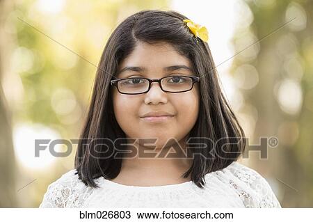 Hispanic girl smiling View Large Photo Image Stock Image - Hispanic girl smiling. Fotosearch