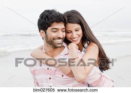 Indian couple hugging on beach View Large Photo Image Stock Photography - Indian couple hugging on beach. Fotosearch