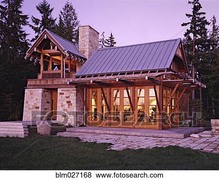 Modern house at dusk View Large Photo Image Stock Photo - Modern house at dusk. Fotosearch