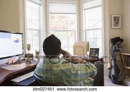 Pacific Islander businessman working at desk View Large Photo Image Stock Image - Pacific Islander businessman working at desk. Fotosearch