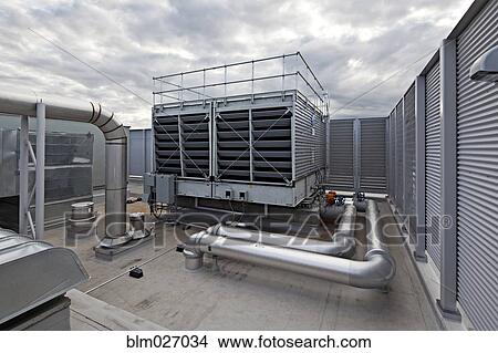 Pipe infrastructure on roof of building View Large Photo Image Picture - Pipe infrastructure on roof of building. Fotosearch