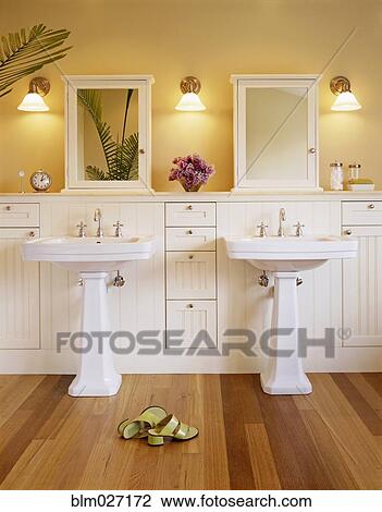 Shoes and pedestal sinks in luxury bathroom View Large Photo Image Stock Image - Shoes and pedestal sinks in luxury bathroom. Fotosearch