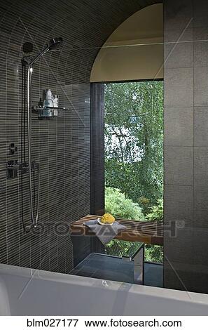Shower and bench in modern bathroom View Large Photo Image Stock Photo - Shower and bench in modern bathroom. Fotosearch