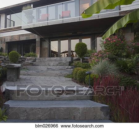Stone steps behind modern home View Large Photo Image Stock Photograph - Stone steps behind modern home. Fotosearch