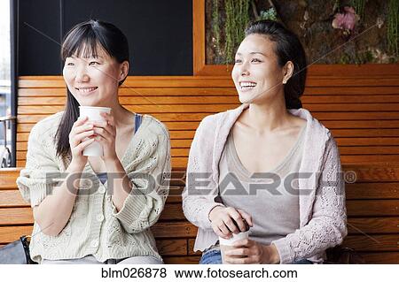 Women having coffee together View Large Photo Image Stock Photo - Women having coffee together. Fotosearch