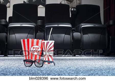 3D glasses, popcorn and soda in home theater View Large Photo Image Stock Photograph - 3D glasses, popcorn and soda in home theater. Fotosearch