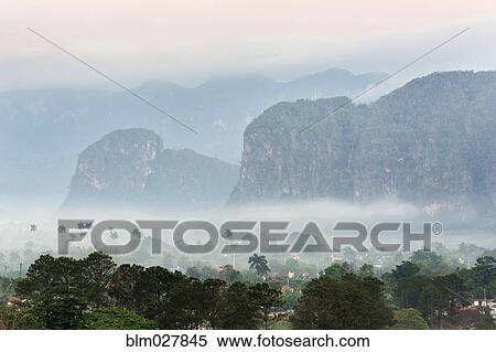Stock Photography - Aerial view of foggy coastline, Vinales, Pinar del Rio, Cuba. Fotosearch