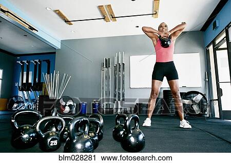 African American woman working out in gym View Large Photo Image Stock Image - African American woman working out in gym. Fotosearch