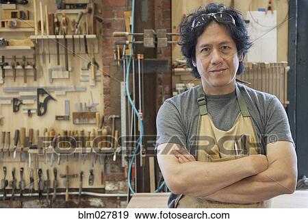 Asian carpenter in workshop View Large Photo Image Stock Photo - Asian carpenter in workshop. Fotosearch