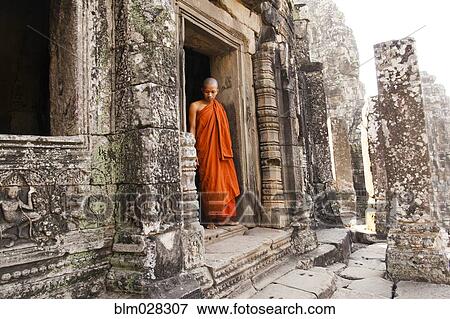 Stock Photo - Buddhist monk at temple, Angkor, Siem Reap, Cambodia. Fotosearch