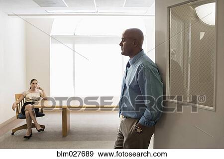 Stock Photo - Business people in office. Fotosearch