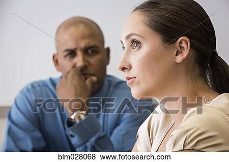 Stock Photo - Business people listening in meeting. Fotosearch