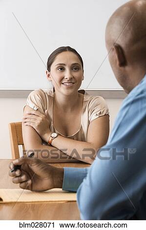 Business people talking in meeting View Large Photo Image Stock Image - Business people talking in meeting. Fotosearch
