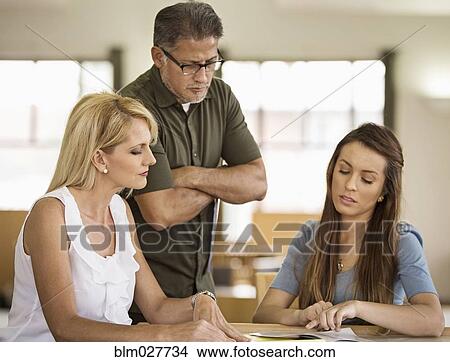 Business people talking in office View Large Photo Image Picture - Business people talking in office. Fotosearch
