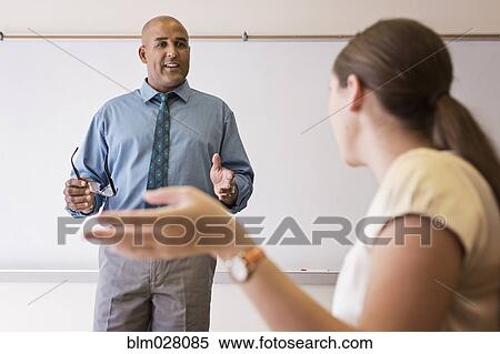 Business people talking in office View Large Photo Image Stock Photography - Business people talking in office. Fotosearch