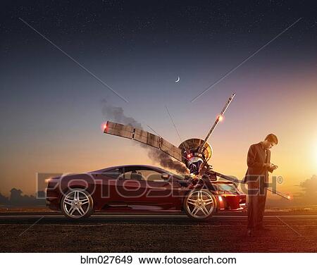 Caucasian man using cell phone by car wreck View Large Photo Image Stock Photo - Caucasian man using cell phone by car wreck. Fotosearch