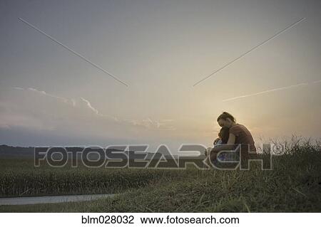 Caucasian mother and daughter hugging in field View Large Photo Image Stock Image - Caucasian mother and daughter hugging in field. Fotosearch