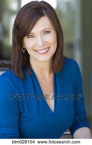 Picture - Caucasian woman smiling. Fotosearch