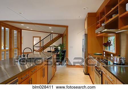 Counter tops, stove and sink in kitchen View Large Photo Image Stock Image - Counter tops, stove and sink in kitchen. Fotosearch