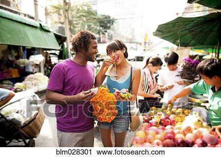 Couple shopping in outdoor market, Bangkok, Bangkok, Thailand View Large Photo Image Stock Image - Couple shopping in outdoor market, Bangkok, Bangkok, Thailand. Fotosearch