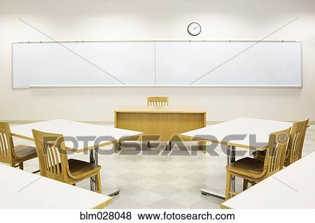 Desks And Chairs In Empty Lecture Hall Stock Photo Blm028048