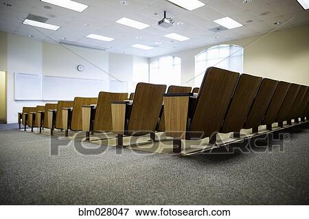 Stock Photo - Empty seats in lecture hall. Fotosearch