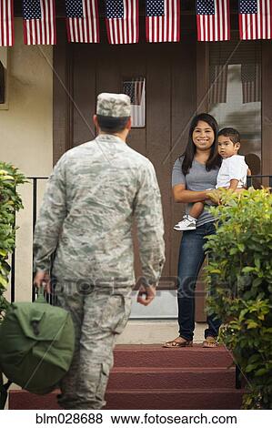 Family greeting returning soldier View Large Photo Image Stock Photo - Family greeting returning soldier. Fotosearch
