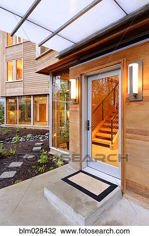 Stock Image - Glass windows and doors of modern house. Fotosearch