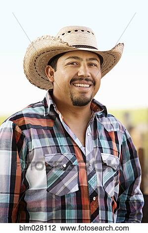 Hispanic man smiling outdoors View Large Photo Image Stock Image - Hispanic man smiling outdoors. Fotosearch