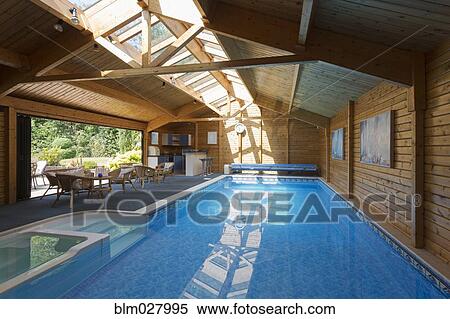 Indoor swimming pool under skylight View Large Photo Image Stock Photography - Indoor swimming pool under skylight. Fotosearch