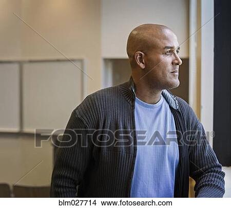 Picture - Man looking away. Fotosearch