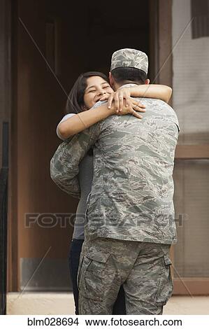 Returning soldier greeting girlfriend outdoors View Large Photo Image Picture - Returning soldier greeting girlfriend outdoors. Fotosearch
