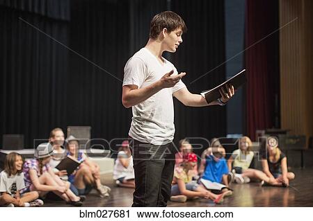 Students practicing lines on stage View Large Photo Image Stock Image - Students practicing lines on stage. Fotosearch