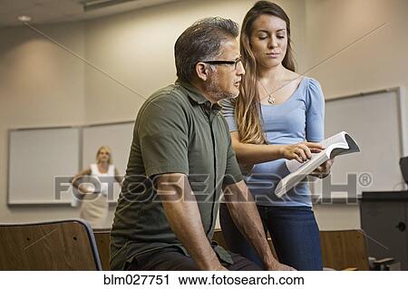 Students talking in classroom View Large Photo Image Stock Image - Students talking in classroom. Fotosearch