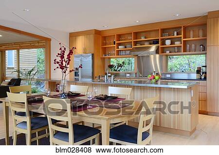 Table and chairs in kitchen View Large Photo Image Stock Photo - Table and chairs in kitchen. Fotosearch