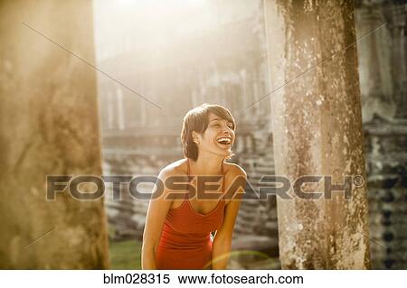 Woman visiting ancient temple, Angkor, Siem Reap, Cambodia View Large Photo Image Stock Photography - Woman visiting ancient temple, Angkor, Siem Reap, Cambodia. Fotosearch