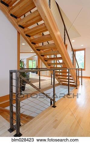 Wooden staircase in modern home View Large Photo Image Stock Image - Wooden staircase in modern home. Fotosearch