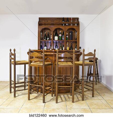 Bar and stools in basement View Large Photo Image Stock Image - Bar and stools in basement. Fotosearch