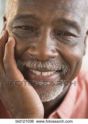 Black man smiling View Large Photo Image Stock Photograph - Black man smiling. Fotosearch