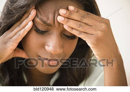 Black woman frowning with head in hands View Large Photo Image Stock Photo - Black woman frowning with head in hands. Fotosearch